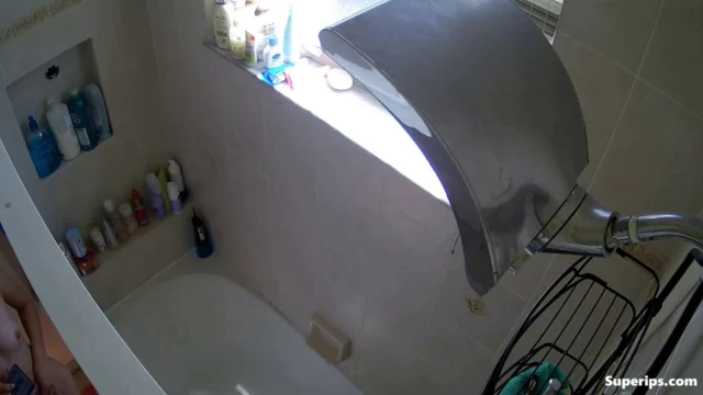 IPCAM – Petite teenage girl takes a long shower IPCAM – Petite teenage girl takes a long shower