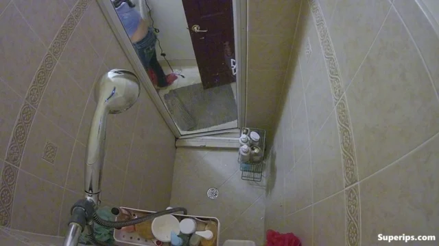 IPCAM – German college girl takes a long shower IPCAM – German college girl takes a long shower